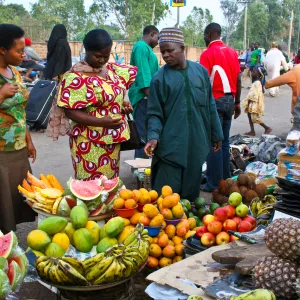 Fruit stall: Our host helps us make a selection of fruits at the 'Park’ market.