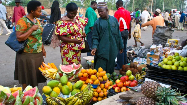 Fruit stall: Our host helps us make a selection of fruits at the 'Park’ market.